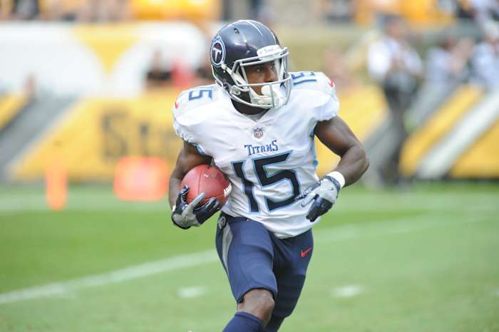 Tennessee Titans special teams player Darius Jennings (15) returns a second quarter kick against the Pittsburgh Steelers at Heinz Field.